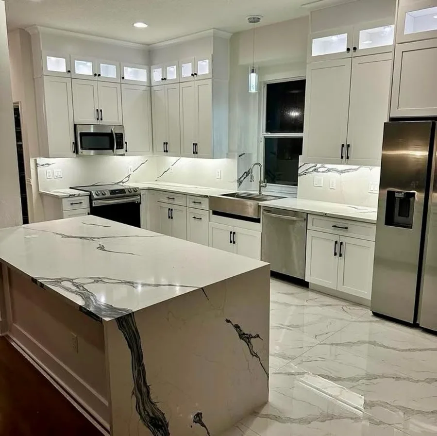 Kitchen island with a waterfall panel falling to the floor
